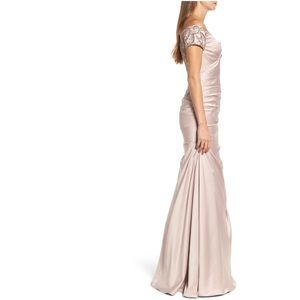 la femme beaded back off the shoulder gown